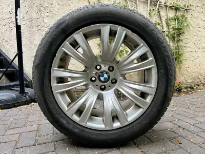Priced to move! Staggered set of four BMW 223M alloy wheels with winter tires mounted. These were us...