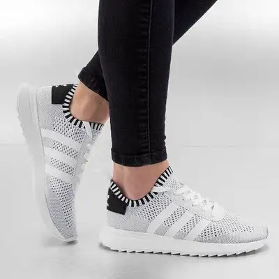 Brand new in box, never been worn adidas Originals Flashback W Primeknit shoes in a sock-like design...