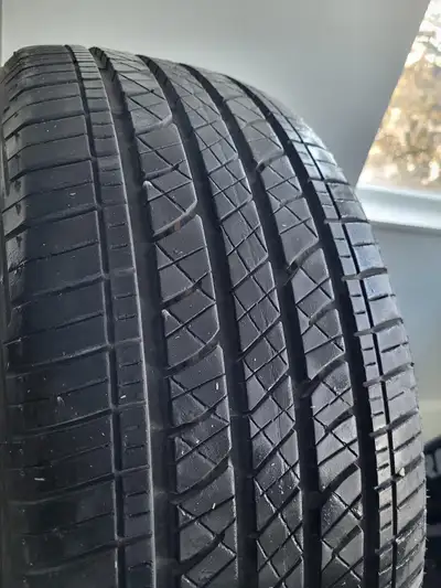 Less than 5000km, brand new all season tires