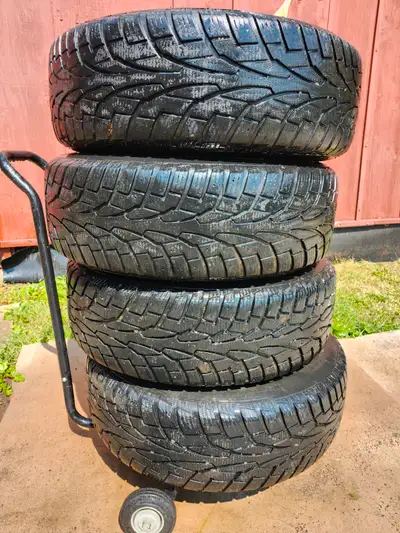 uniroyal tiger paws M/S used on toyota rims holding air $175