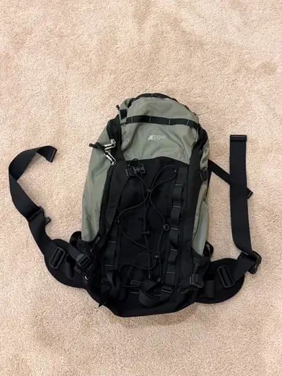 Up for sale is a MEC hiking backpack, perfect for day hikes, travel, or any outdoor adventure! Featu...