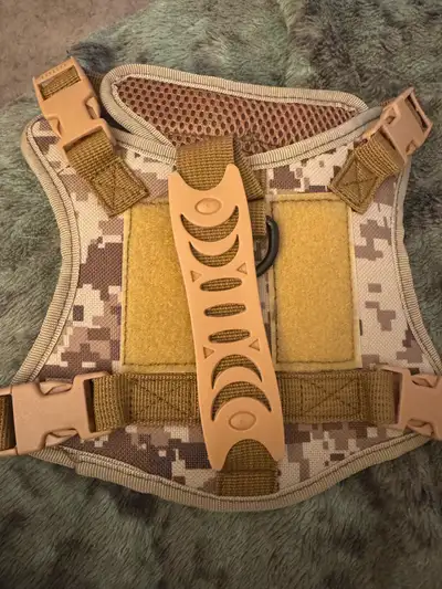 Cat Tactical Vest. Adjustable straps. Neck 24-54CM Chest 35-51CM. Pick up only. No holds. $10. Price...