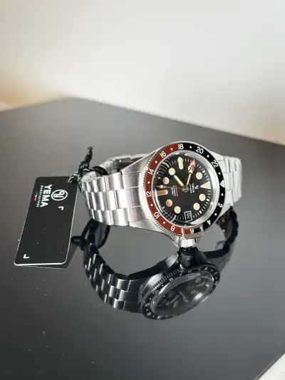 Up for sale is a rare, now-discontinued Yema Superman Worldtime GMT (39mm) featuring the highly soug...