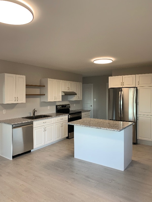 Acreage w/ updated home near Gladstone Houses for Sale Portage la