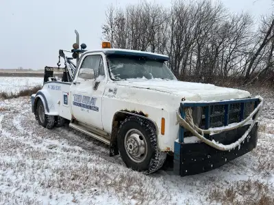 1980 GMC Sierra 3500 Tow Truck, Target Master 350 with a 4spd/granny. Has a 15,000 lb PTO winch that...
