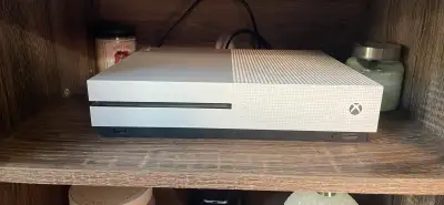 I am selling my girlfriends Xbox one s 500gb. Comes with a corded purple Xbox one controller. Works...