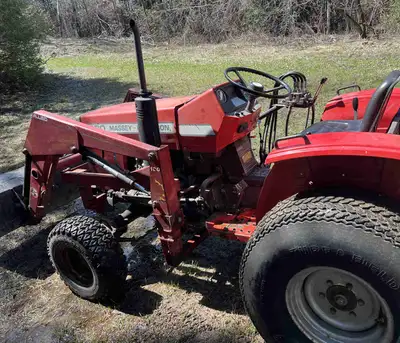 This is a Massey Ferguson 1030 small farm tractor, perfect for various tasks around your property. I...