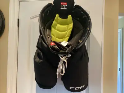 CCM men’s hockey pants., View more