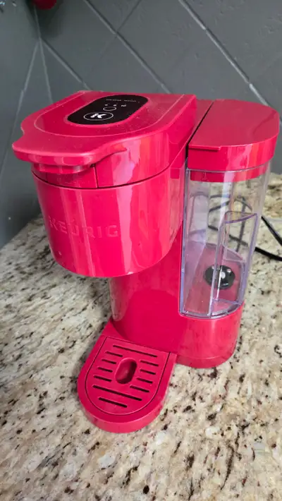 Keurig single cup coffee maker. With pods of coffee and reusable, View more