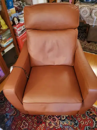 Genuine Leather Recliner Chair. Lightly used for 5 months. Original price was $4,000 from Chesterfie...
