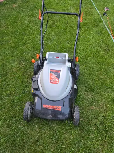 Cordless lawn mower ... needs a battery, View more
