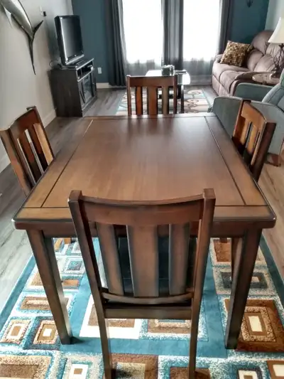 Dining room table and chairs for sale $300, View more
