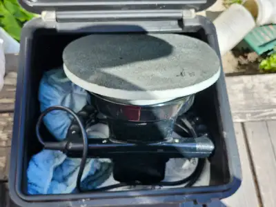 A car waxer/ polisher. it comes with two buffers and an instruction manual.