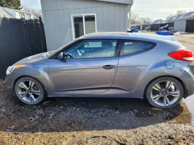 2012 Hyundai Veloster for sale, second owner, full maintenance history, car functions well but body...