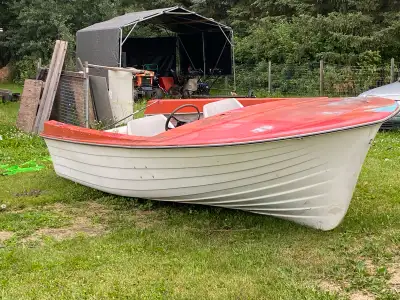 Fiberglass boat from 1960s, partially restored a few years back ,Treated plywood floor, pedestal sea...