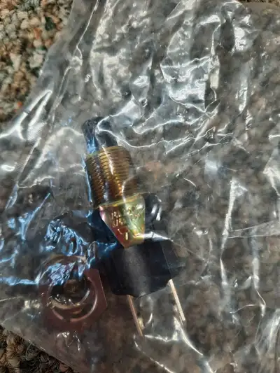 Here's a brand new Temperature Switch, ready to keep things just right. This little gadget is new, s...