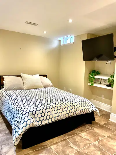 Basement Studio Apartment available in a quiet residential neighbourhood. The unit features an open-...