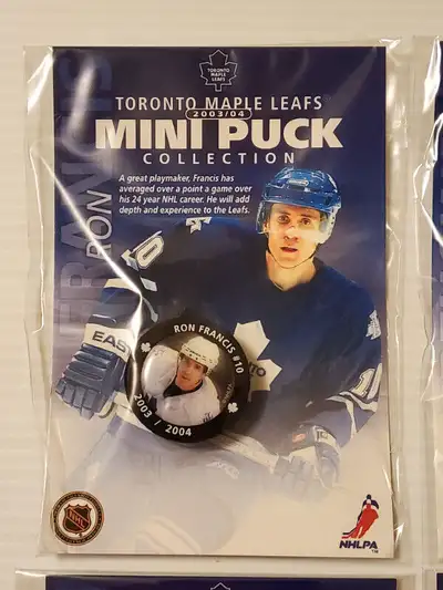 *** 2003-04 TORONTO MAPLE LEAFS MINI PUCKS - Bonus Insert Set of 4 *** In addition to the 24 Mini Pu...