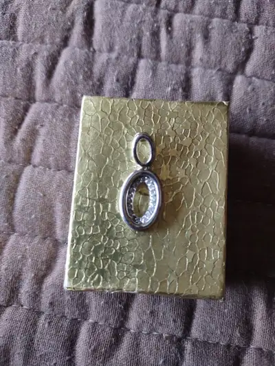 One stamped 925 Silver ladies pendant., View more