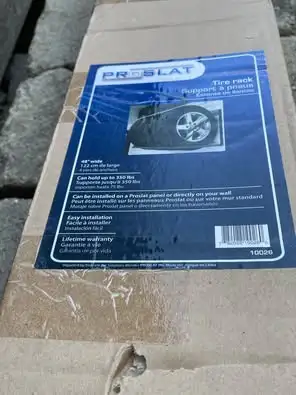 Brand new, still in box, never opened. This is a very strong rack. * Holds up to 4 standard tires wi...