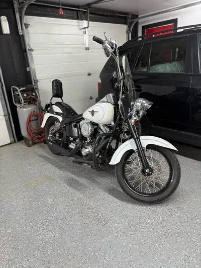 2003 fatboy. Real nice bike Quite a few mods. Screaming Eagal kit,programmed exhaust, ape hangers, n...