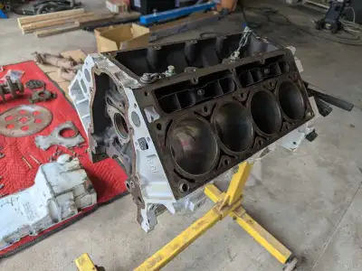 Complete engine core. Disassembled and found spun crank bearings. Early LQ4 with cast iron heads. Bl...