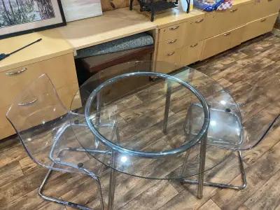 Transparent chairs glass table