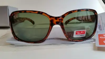 Ray Ban Sunglasses (not original). In storage for over 20 years. New in Box. Great Quality. $15 firm