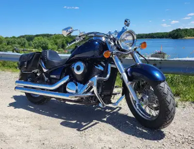 Great shape. Passenger seat as well. Saddle bags. Quick attach windshield. Regular maintenance... Ne...