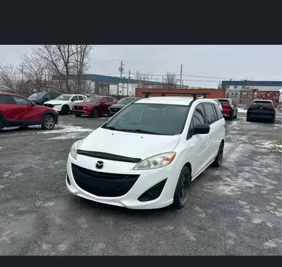 Bonjour je vends mon Mazda Il y’a aucun problème mecanique Pneus d hiver Pneu d été