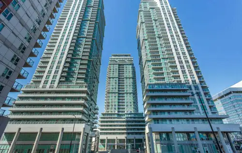 With walkout balcony, unobstructed south west view of CN Tower, Lake and sunset. Laminate floor in l...