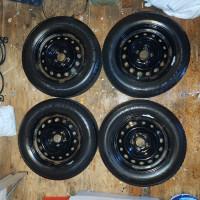 Four 215/60R16 Motomaster Winter Edge Tires on Steel Rims
