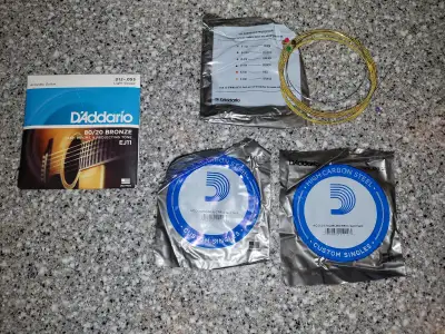 Here's a set of D'Addario EJ11 Light Acoustic Guitar Strings, this is incomplete as one string is mi...
