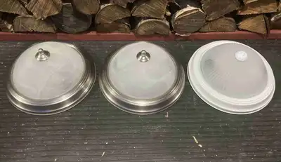 I have three flush mount light fixtures for sale. One white & two pewter colour. In new condition. A...