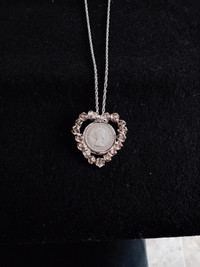 Heart necklace with 1955 coin and roses
