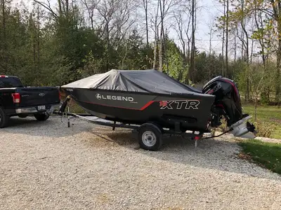 Legend 18XTR Troller model purchased new in 2021 c/w Mercury 115HP ProXS engine and EZ Load trailer....