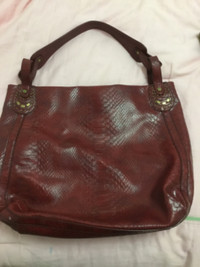 Red leather hand bag by  Liz Claiborne