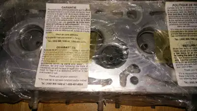 This is a brand new, never-used GM cylinder head, still sealed in its original packaging, ready to b...