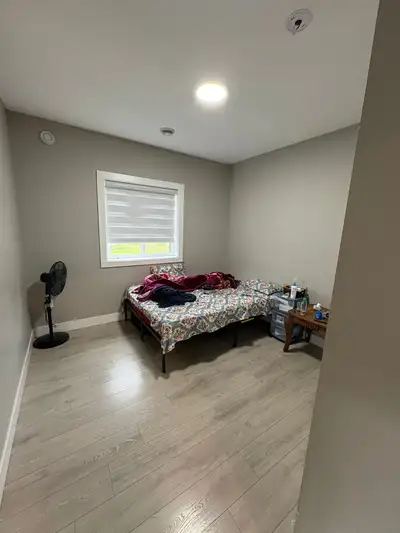 TWO BEDROOM BASEMENT NEAR NEWTON BUS EXCHANGE ALL UTILITIES INCLUDED CAR PARKING AVAILABLE LAUNDRY A...