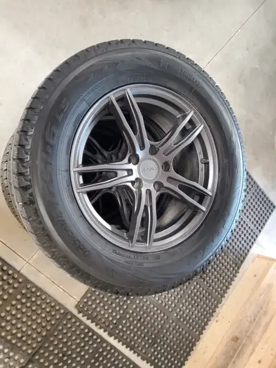 235/65R17 104H. 9-10/32 tread depth. Even wear. Wheels are Envy EV5 Titanium. 17x7, 5x114.3 All nice...