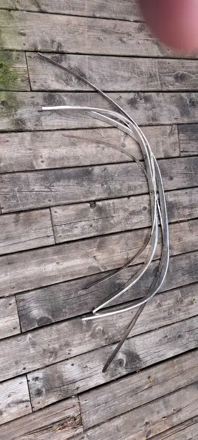 4 fender well trim for demon, duster or dart. Came off my 71 dodge demon. Might need a little TLC.
