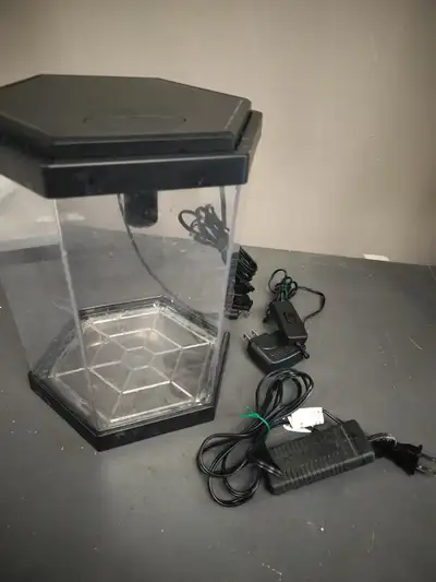 2 gallon top fin fish tank with filter, light, and heater. Perfect for snails, shrimp, or a small be...