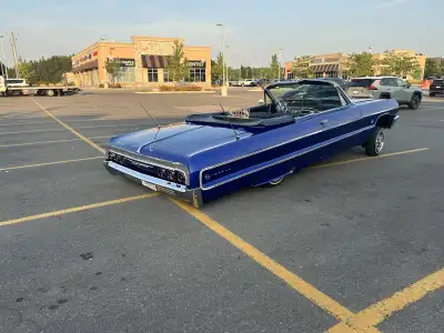1964 impala convertible lowrider,has 350/700R transmission, fully wrapped and mold d frame,shortened...