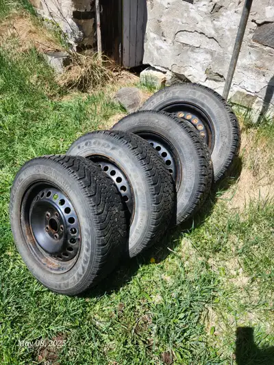 up for sale is a set of used winter tires on rims. Tire size is 195 65 15 Good year nordic tires wit...