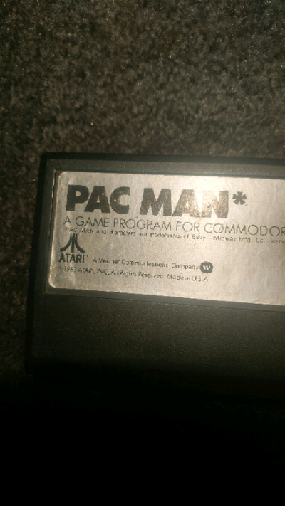 Commodore 64 paddles joystick and video cartridges Commodore Vic 1110 8K Ram cartridge Pac-Man cartr...