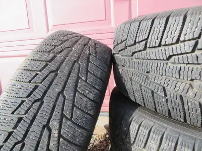 $350 4 Nokian Hakhapeliita 215/60 R16 winter tires mounted on Altima wheels.