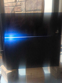 PS4 (Great condition) plus remote with thumb grips!!