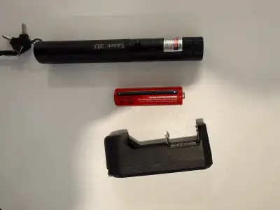 Green laser pointer (532nm, 5mW) in like new condition, barely used (only a couple of times). Includ...