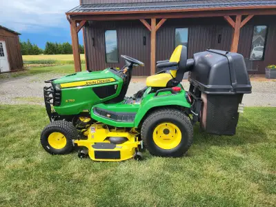 John Deere x750 Signature Series Diesel riding lawnmower with 54 inch deck and factory Power flow 17...