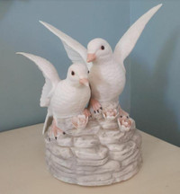 Pair of vintage porcelain doves on musical base music box works!